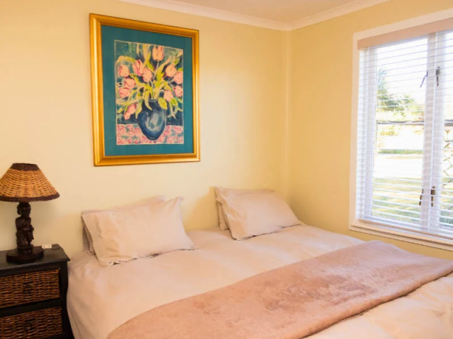 double bed in cottage two